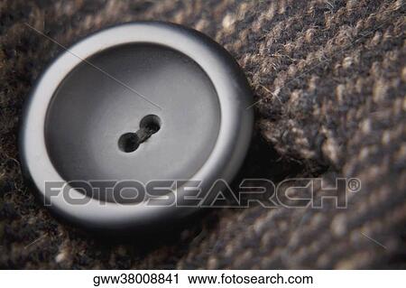 Close-up of a button on a sweater View Large Photo Image Stock Image - Close-up of a button on a sweater. Fotosearch