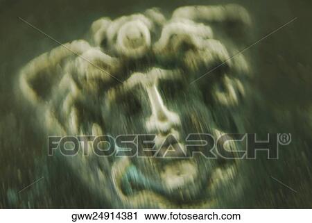 Close-up of a carved statue View Large Photo Image Stock Image - Close-up of a carved statue. Fotosearch