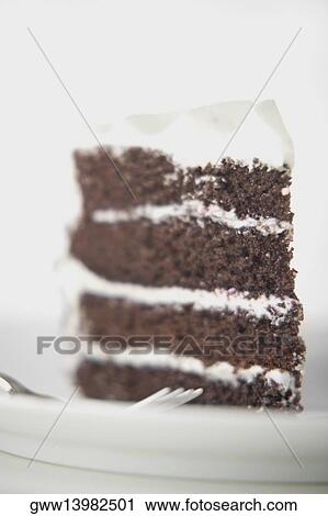 Close-up of a chocolate pastry in a plate View Large Photo Image Stock Image - Close-up of a chocolate pastry in a plate. Fotosearch