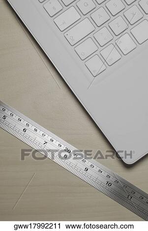 Close-up of a computer keyboard with a ruler View Large Photo Image Stock Image - Close-up of a computer keyboard with a ruler. Fotosearch