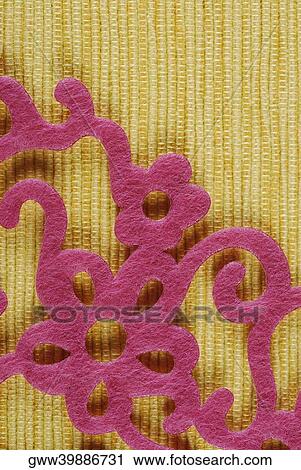 Close-up of a floral design over a woven mat View Large Photo Image Stock Image - Close-up of a floral design over a woven mat. Fotosearch
