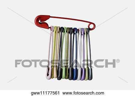 Close-up of a group of multi-colored safety pins View Large Photo Image Stock Image - Close-up of a group of multi-colored safety pins. Fotosearch