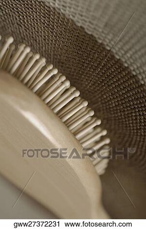 Close-up of a hairbrush with a mat View Large Photo Image Stock Image - Close-up of a hairbrush with a mat. Fotosearch