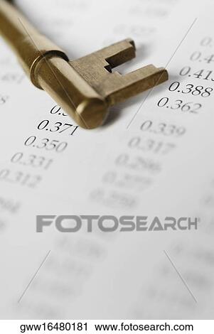 Close-up of a key on a financial page View Large Photo Image Stock Image - Close-up of a key on a financial page. Fotosearch