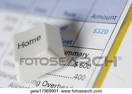 Close-up of a key on a financial page View Large Photo Image Stock Image - Close-up of a key on a financial page. Fotosearch