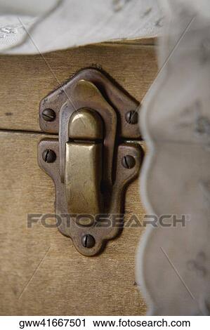 Close-up of a lock on a wooden box View Large Photo Image Stock Image - Close-up of a lock on a wooden box. Fotosearch