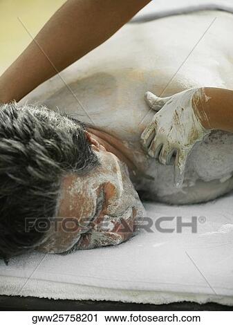 Close-up of a mature man getting spa treatment View Large Photo Image Stock Image - Close-up of a mature man getting spa treatment. Fotosearch