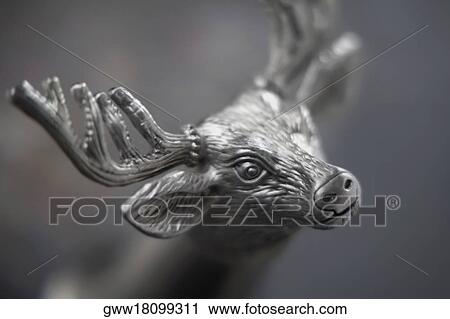 Close-up of a metal figurine of a reindeer View Large Photo Image Stock Image - Close-up of a metal figurine of a reindeer. Fotosearch