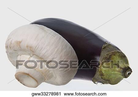 Close-up of a mushroom and an eggplant View Large Photo Image Stock Image - Close-up of a mushroom and an eggplant. Fotosearch