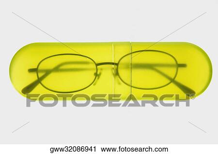 Stock Image - Close-up of a pair of eyeglasses in an eyeglasses case. Fotosearch