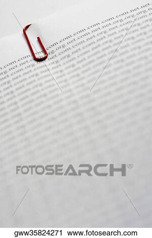 Close-up of a paper clip on a document View Large Photo Image Stock Image - Close-up of a paper clip on a document. Fotosearch