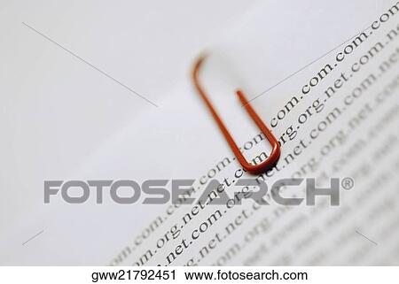 Close-up of a paper clip on documents View Large Photo Image Stock Image - Close-up of a paper clip on documents. Fotosearch