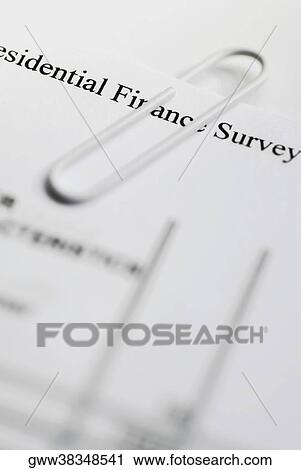 Close-up of a paper clip on documents View Large Photo Image Stock Image - Close-up of a paper clip on documents. Fotosearch