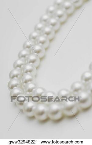Stock Image - Close-up of a pearl necklace. Fotosearch