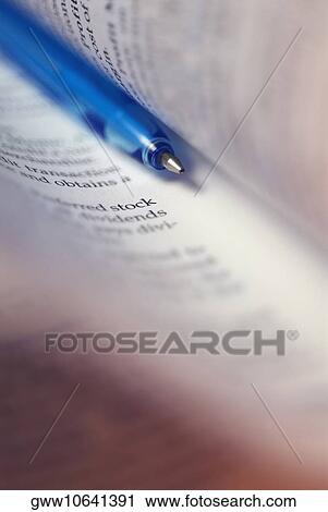 Close-up of a pen in a book View Large Photo Image Stock Image - Close-up of a pen in a book. Fotosearch