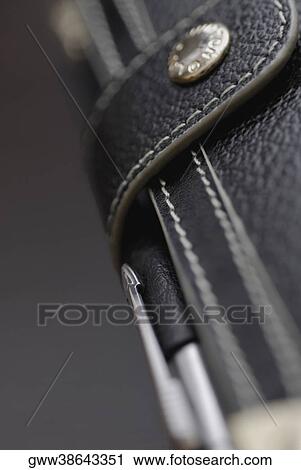 Close-up of a pen in a wallet View Large Photo Image Stock Image - Close-up of a pen in a wallet. Fotosearch
