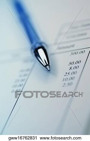 Stock Image - Close-up of a pen on a document. Fotosearch
