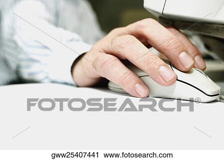 Close-up of a person's hand using a computer mouse View Large Photo Image Stock Image - Close-up of a person's hand using a computer mouse. Fotosearch