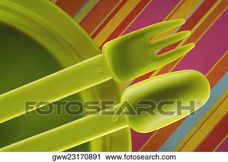 Close-up of a plastic fork and a spoon on a plate View Large Photo Image Stock Image - Close-up of a plastic fork and a spoon on a plate. Fotosearch