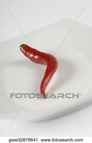 Close-up of a red chili pepper in a bowl View Large Photo Image Stock Image - Close-up of a red chili pepper in a bowl. Fotosearch