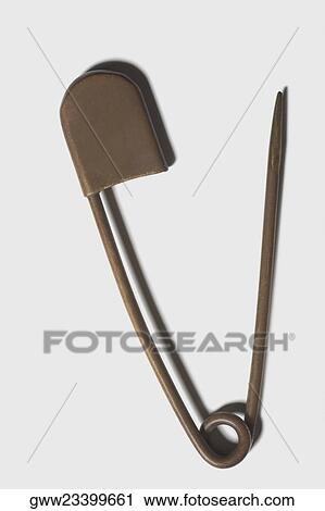 Close-up of a safety pin View Large Photo Image Stock Image - Close-up of a safety pin. Fotosearch