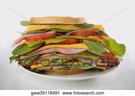 Close-up of a sandwich on a plate View Large Photo Image Stock Image - Close-up of a sandwich on a plate. Fotosearch
