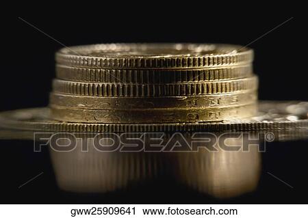 Close-up of a stack of coins View Large Photo Image Stock Image - Close-up of a stack of coins. Fotosearch
