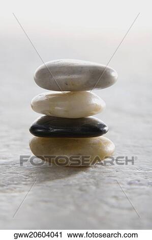 Stock Image - Close-up of a stack of pebbles. Fotosearch