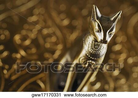 Close-up of a statue of a cat View Large Photo Image Stock Image - Close-up of a statue of a cat. Fotosearch