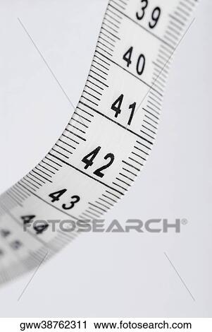 Close-up of a tape measure View Large Photo Image Stock Image - Close-up of a tape measure. Fotosearch