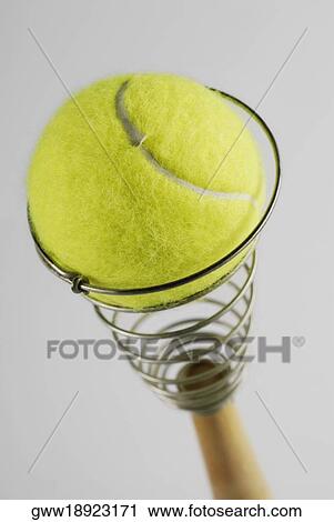 Close-up of a tennis ball on an egg beater View Large Photo Image Stock Image - Close-up of a tennis ball on an egg beater. Fotosearch