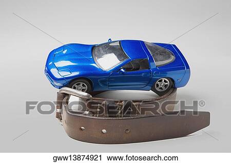 Close-up of a toy car on a belt View Large Photo Image Stock Image - Close-up of a toy car on a belt. Fotosearch