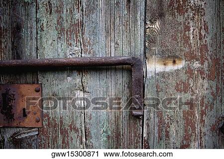 Close-up of a wooden door with a latch View Large Photo Image Stock Image - Close-up of a wooden door with a latch. Fotosearch