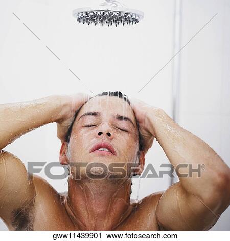 Close-up of a young man having a shower View Large Photo Image Stock Image - Close-up of a young man having a shower. Fotosearch