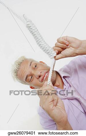 Close-up of a young man with a noose around his neck View Large Photo Image Stock Image - Close-up of a young man with a noose around his neck. Fotosearch