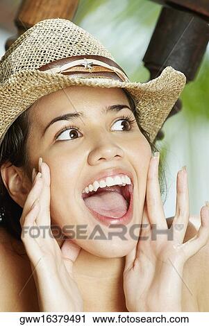 Close-up of a young woman shouting View Large Photo Image Stock Image - Close-up of a young woman shouting. Fotosearch