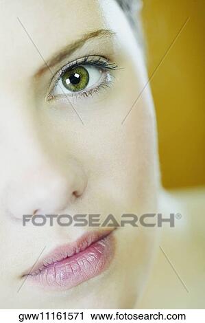 Stock Image - Close-up of a young woman's face. Fotosearch