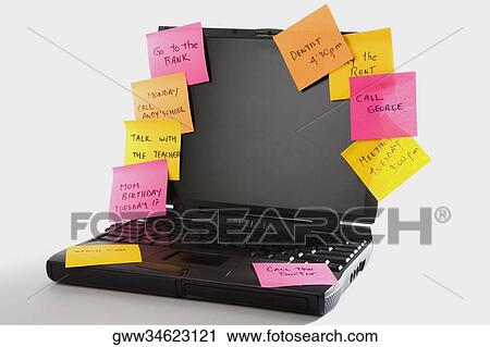 Close-up of adhesive notes on a laptop View Large Photo Image Stock Image - Close-up of adhesive notes on a laptop. Fotosearch