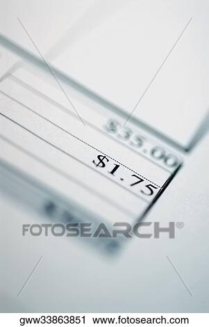 Close-up of amount written on a bill View Large Photo Image Stock Image - Close-up of amount written on a bill. Fotosearch