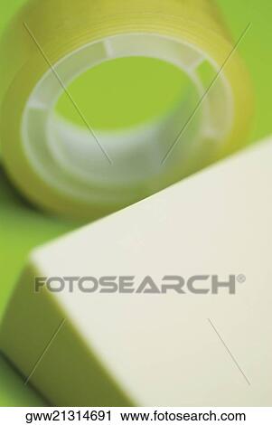 Close-up of an adhesive note with an adhesive tape View Large Photo Image Stock Image - Close-up of an adhesive note with an adhesive tape. Fotosearch
