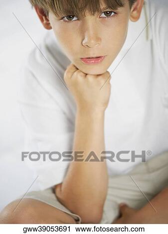 Close-up of an angry boy View Large Photo Image Stock Image - Close-up of an angry boy. Fotosearch