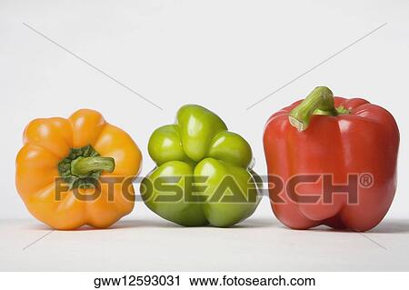 Stock Image - Close-up of bell peppers in a row. Fotosearch