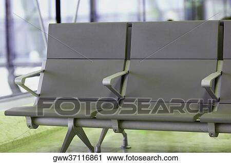 Close-up of benches at an airport, Madrid, Spain View Large Photo Image Stock Image - Close-up of benches at an airport, Madrid, Spain. Fotosearch
