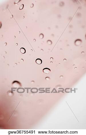 Close-up of bubbles in soda View Large Photo Image Stock Image - Close-up of bubbles in soda. Fotosearch