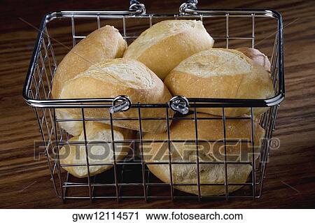 Close-up of buns in a basket View Large Photo Image Stock Image - Close-up of buns in a basket. Fotosearch