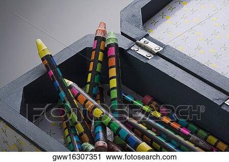 Stock Image - Close-up of colored pencils in a box. Fotosearch