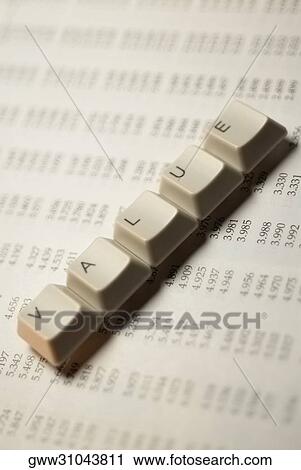Stock Image - Close-up of computer keys on a financial page. Fotosearch
