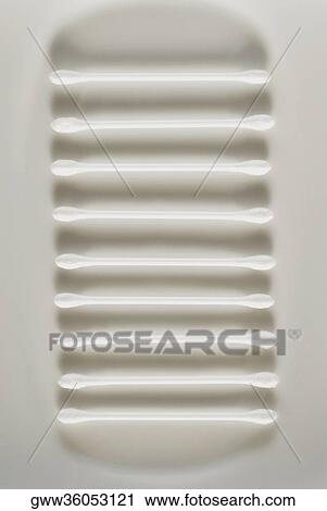 Stock Image - Close-up of cotton swabs on a tray. Fotosearch