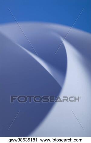Stock Image - Close-up of curled paper. Fotosearch