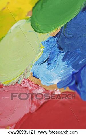 Close-up of different color paints smeared on a palette View Large Photo Image Stock Image - Close-up of different color paints smeared on a palette. Fotosearch